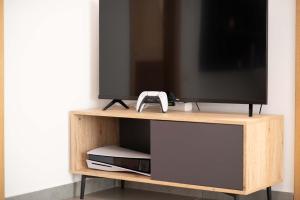 TV a/nebo společenská místnost v ubytování Actea Seaview Villas I "Free" heated pool & 800m sea