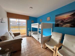 Postel nebo postele na pokoji v ubytování Apartamento Portosin con piscina al lado de la playa + 16 fotografií