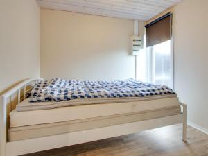 Ліжко або ліжка в номері Holiday Home Aud - 300m from the sea in NE Jutland by Interhome