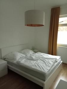 Ліжко або ліжка в номері Stadtgrün 2