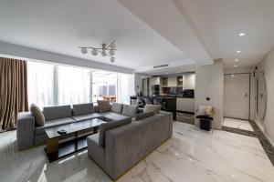 a living room with a couch and a table at Luxury City Centre in Alicante