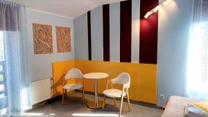 Posezení v ubytování Alba Hotel