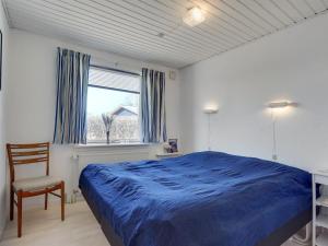 Postel nebo postele na pokoji v ubytování Holiday Home Fredrikke - 50m from the sea by Interhome