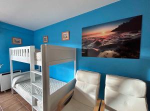 Postel nebo postele na pokoji v ubytování Apartamento Portosin con piscina al lado de la playa
