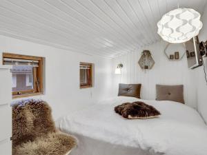 Postel nebo postele na pokoji v ubytování Holiday Home Wanona - 1-9km from the sea in NE Jutland by Interhome