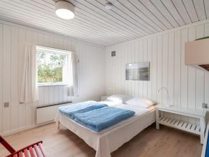 Postel nebo postele na pokoji v ubytování Apartment Ara - 700m from the sea in NW Jutland by Interhome