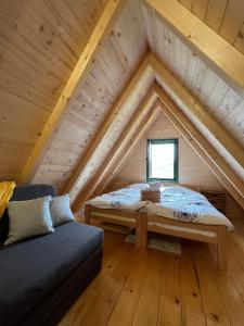 Uma cama ou camas num quarto em Brvnare Puljci