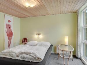 Postel nebo postele na pokoji v ubytování Holiday Home Samine - 100m from the sea by Interhome