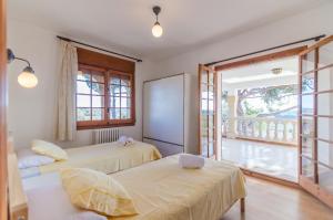 Postel nebo postele na pokoji v ubytování Club Villamar - Alvent