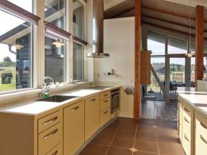 Kuchyň nebo kuchyňský kout v ubytování Holiday Home Preben - 500m from the sea by Interhome