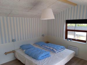 Postel nebo postele na pokoji v ubytování Holiday Home Grubbe - 600m from the sea by Interhome