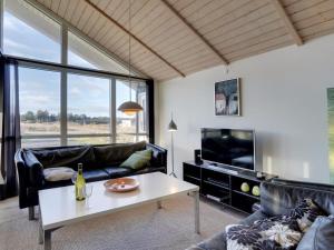 A seating area at Holiday Home Frejdis - 1-1km from the sea in NW Jutland by Interhome