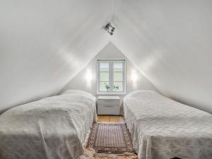 Lova arba lovos apgyvendinimo įstaigoje Apartment Flaminia - 150m from the sea in NW Jutland by Interhome