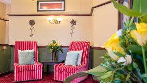 Posezení v ubytování Sutcliffe Hotel