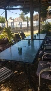 two ping pong tables with bowls on top of them at Wimmera Motel in Nhill