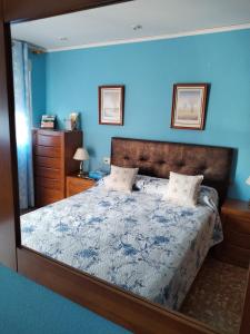 A bed or beds in a room at Habitacion Azul