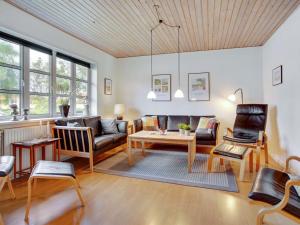 A seating area at Holiday Home Hansiane - 500m from the sea in NW Jutland by Interhome