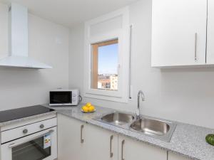 A kitchen or kitchenette at Apartment Policar by Interhome