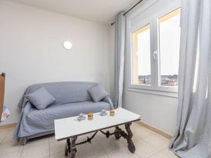 A seating area at Apartment Policar by Interhome