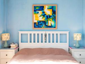 Ein Bett oder Betten in einem Zimmer der Unterkunft Apartment Belle Vue by Interhome