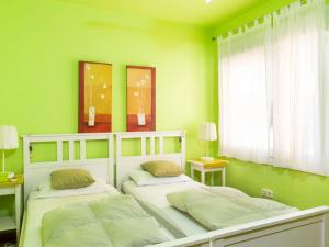 Ein Bett oder Betten in einem Zimmer der Unterkunft Apartment Belle Vue by Interhome