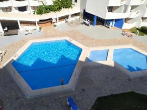 Bazén v ubytovaní Apartamentos Eurhostal 3000 alebo v jeho blízkosti