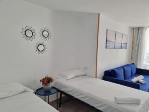 Posteľ alebo postele v izbe v ubytovaní Apartamentos Eurhostal 3000