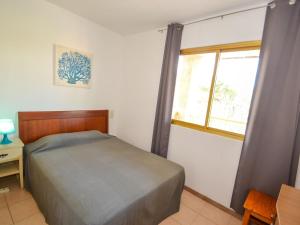 Postel nebo postele na pokoji v ubytování Apartment Catalunya-10 by Interhome