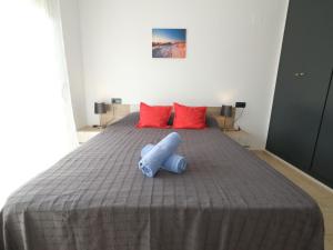 Katil atau katil-katil dalam bilik di Apartment Golden Beach by Interhome