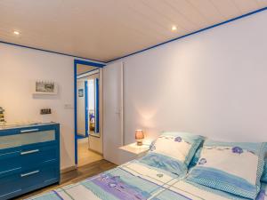 Posteľ alebo postele v izbe v ubytovaní Holiday Home La Glycine by Interhome