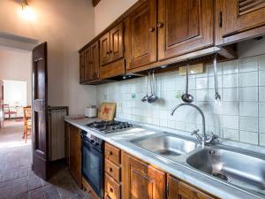 A kitchen or kitchenette at Chalet Amphora by Interhome Még 7 kép