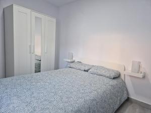Łóżko lub łóżka w pokoju w obiekcie Apartamento mi currilla