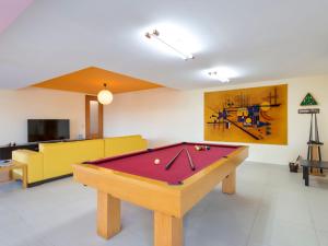 a living room with a pool table and a couch at Villa Almond Tree by Interhome in Porches
