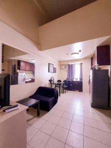 The lobby or reception area at Affordable Cozy and Peaceful Loft Condo near Cubao