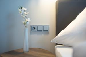 Postel nebo postele na pokoji v ubytování Hotel Herrnbrod & Ständecke