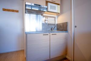 Eldhús eða eldhúskrókur á Appartement Fontana - Welkeys