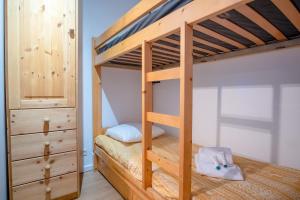 Rúm í herbergi á Appartement Fontana - Welkeys