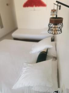 Postel nebo postele na pokoji v ubytování L'auberge Camarguaise