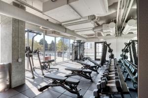 a gym with treadmills and cardio equipment in a building at South Lake Union 1br w wd roof nr Lake Union SEA-503 in Seattle