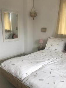 Ένα ή περισσότερα κρεβάτια σε δωμάτιο στο B&B Achterhoeks Halle