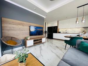 Кухня или мини-кухня в Apartament 44 Aquapark Reda
