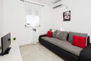 TV a/nebo společenská místnost v ubytování Apartments Sucic