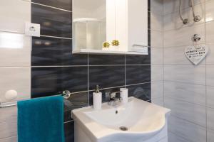 Koupelna v ubytování Apartments Sucic