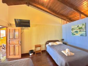 Postel nebo postele na pokoji v ubytování Hotel Brasilito