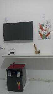 Pousada Santo Amaro tesisinde bir televizyon ve/veya eğlence merkezi