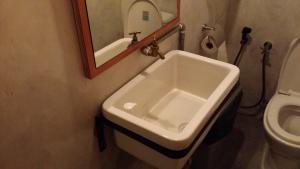 Koupelna v ubytování Go Hotel