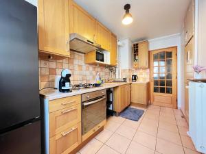 Kuchyňa alebo kuchynka v ubytovaní La Tour - Tout confort - Hypercentre - Balcon #SirDest