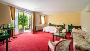 Letto o letti in una camera di Hotel Drachenwand-Mondsee