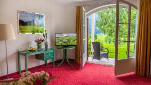 Giardino di Hotel Drachenwand-Mondsee