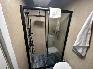 Koupelna v ubytování al khayma suit room
